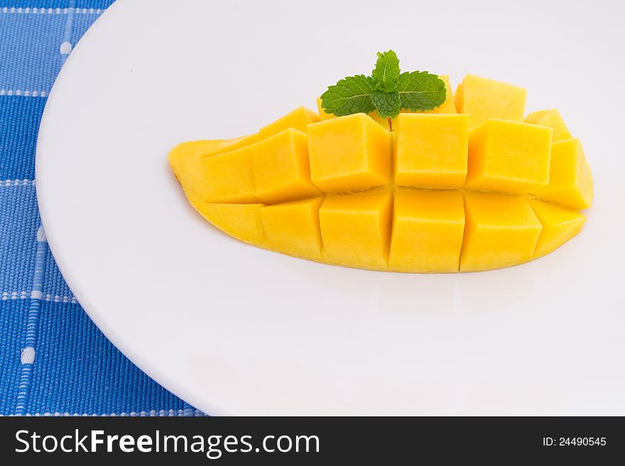 Beautiful mango slice on white dish. Beautiful mango slice on white dish