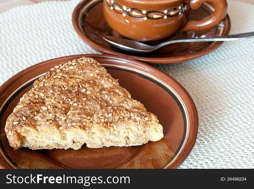 Delicious fresh baked  cake with a cup of coffee. Delicious fresh baked  cake with a cup of coffee