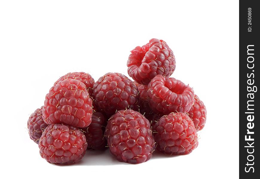 Photo of a bunch of raspberries isolated on a white background