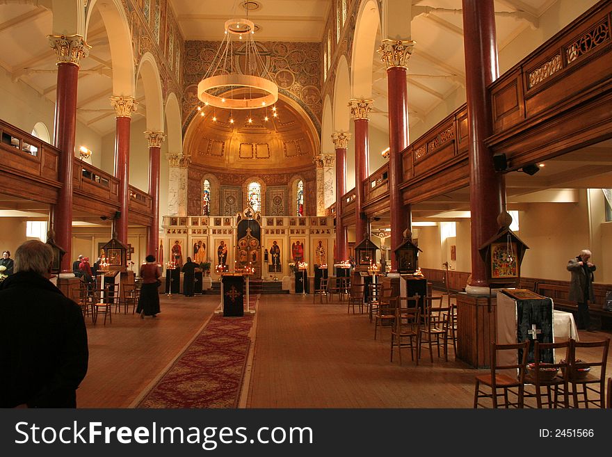 The gold lighted interior of the old orthodox church at the early morning . London. UK. The gold lighted interior of the old orthodox church at the early morning . London. UK.