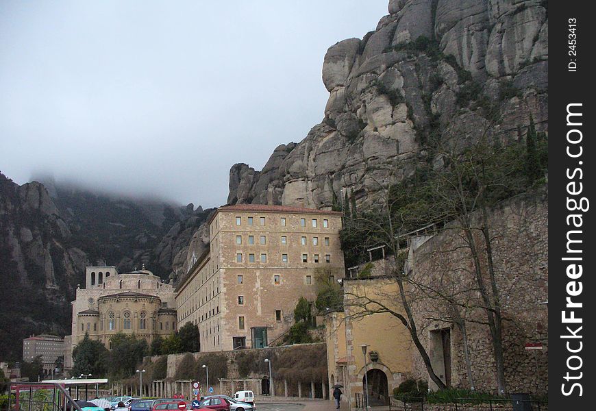 The view of an anciant monanstery in montserrat in spain in the mountain. The view of an anciant monanstery in montserrat in spain in the mountain