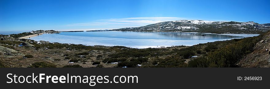 A very cold day on the lagoon above Penhas da Saude, in the Estrela mountain range in Portugal. A very cold day on the lagoon above Penhas da Saude, in the Estrela mountain range in Portugal.