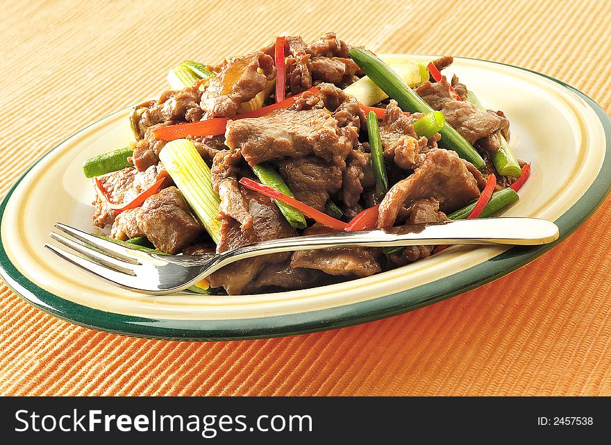 Main course meal of beef with spring onion. Main course meal of beef with spring onion