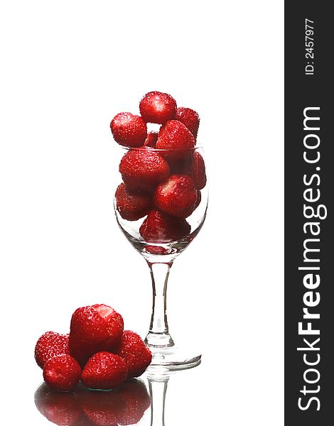 Strawberry in glass on white background. Strawberry in glass on white background