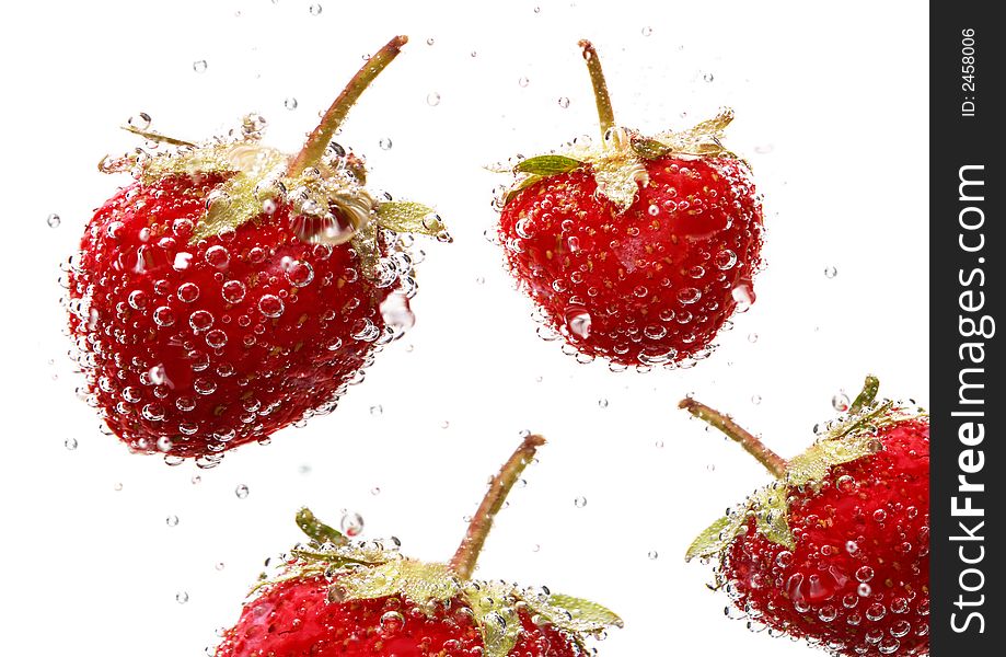 Strawberries in water isolated on white background. Strawberries in water isolated on white background