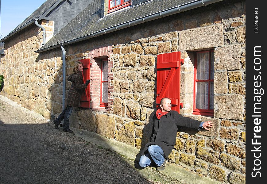 Red windows on old house