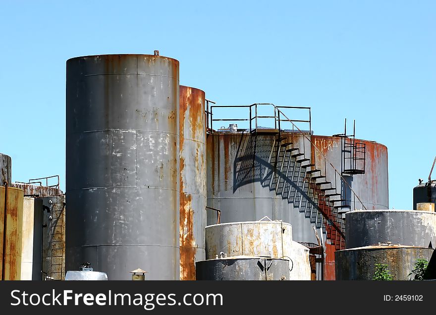 A collection of old rusty tanks and stairs