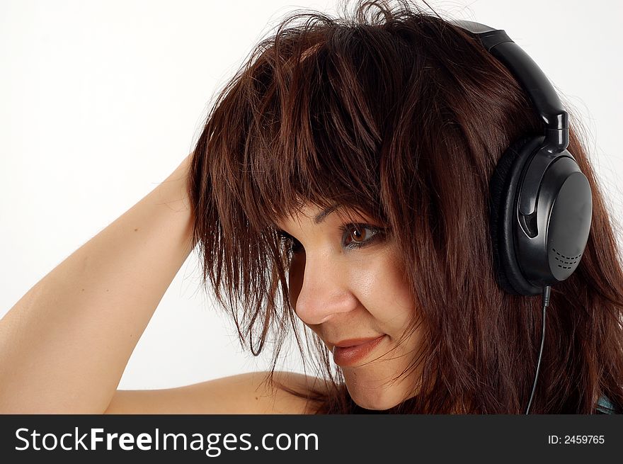 Attractive woman with headphones on white background. Attractive woman with headphones on white background