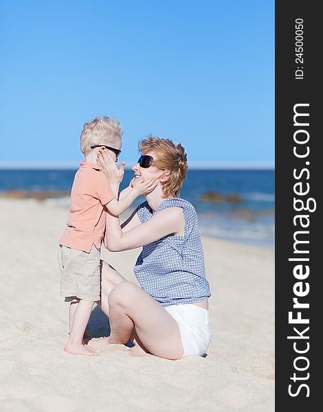 Mother and son together at the beach