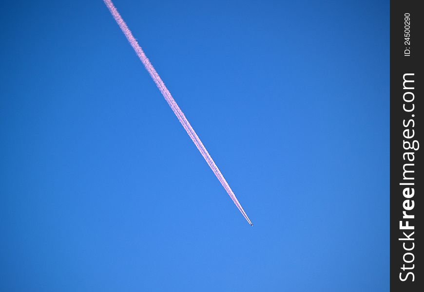 Aerial crossroad clear blue sky with crossing jets contrails. Aerial crossroad clear blue sky with crossing jets contrails