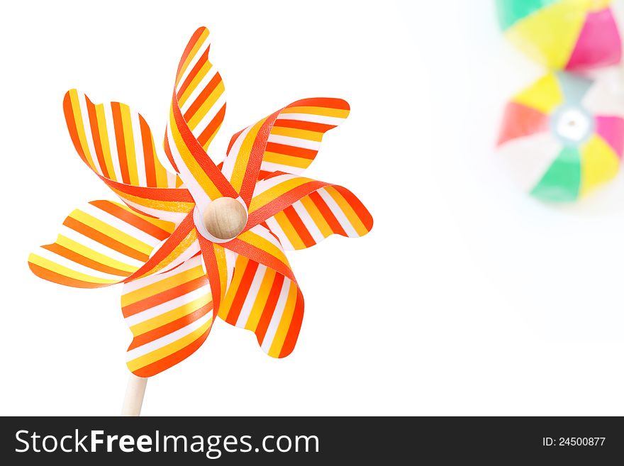 Colorful toy pinwheel on white background