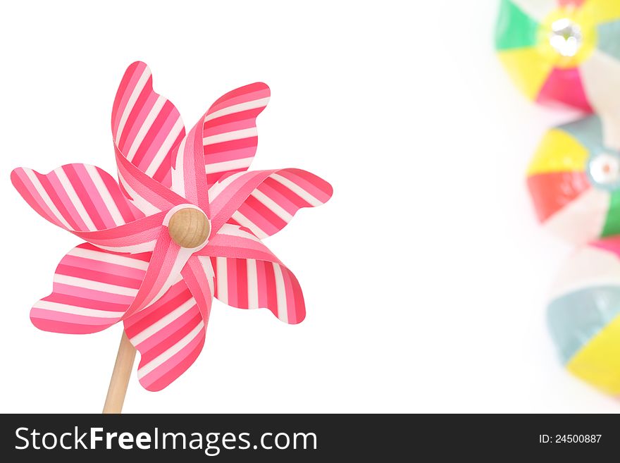 Colorful toy pinwheel on white background