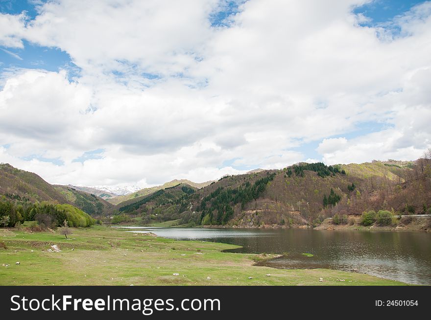 Beautiful nature inside a national park in Romania with mountain lake. Beautiful nature inside a national park in Romania with mountain lake