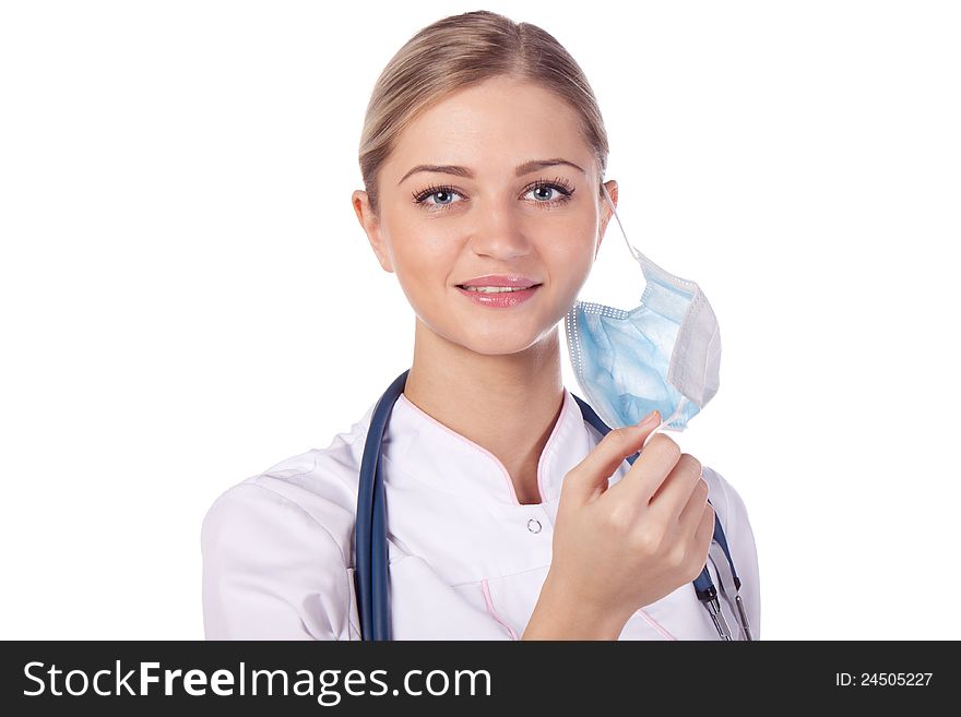 Portrait of a girl doctor in a mask. remove