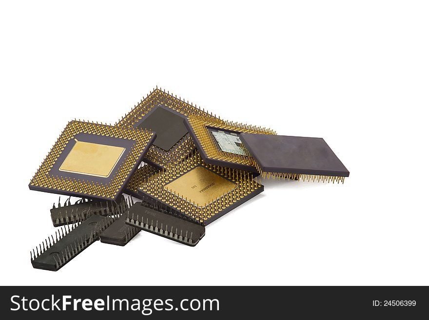 Pile of old processors and other chips isolated