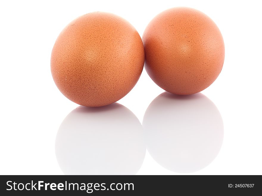 Two chicken eggs  on white background.
