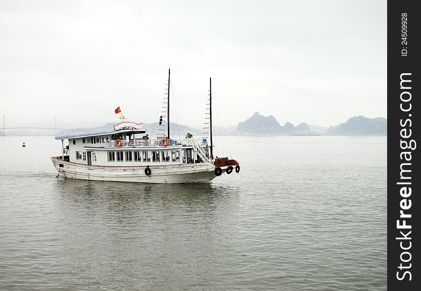 Tourist Boat cruise in Halong Bay, Vietnam. Tourist Boat cruise in Halong Bay, Vietnam.