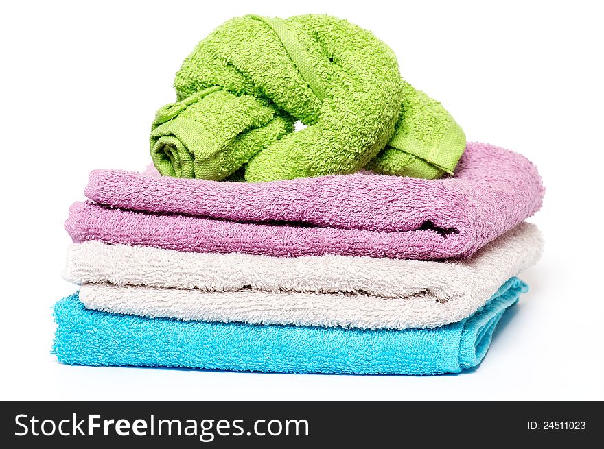 Multi-colored Terry towels on white background. Multi-colored Terry towels on white background