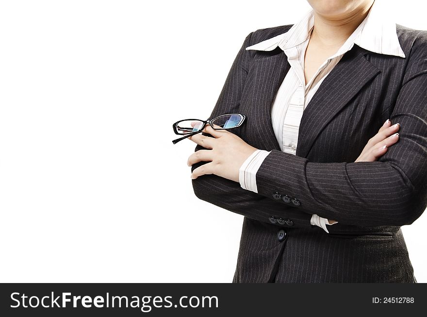 Businesswoman stand with arms crossed and holding glasses. Businesswoman stand with arms crossed and holding glasses