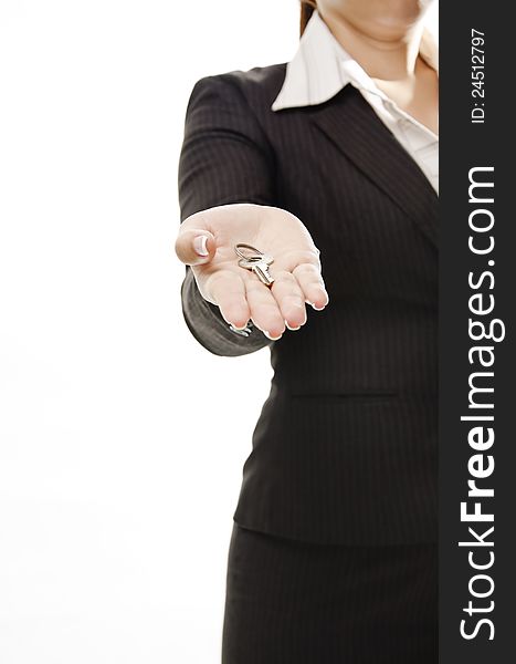 Business woman stand and holding a key. Business woman stand and holding a key