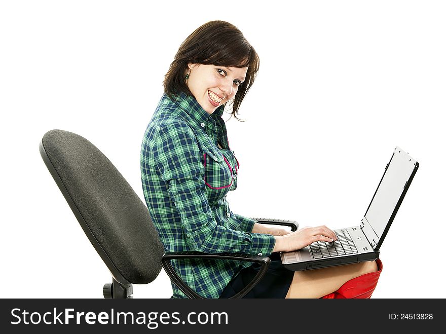 Girl works for a laptop isolated