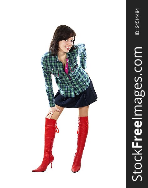 Beautiful girl standing in the red boots isolated