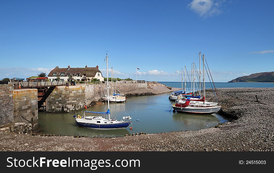 Porlock Harbour in Somerset, England with Sailing Boats anchored