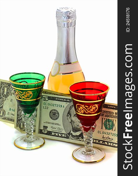 Wine-glasses wine and dollars on a white background. Wine-glasses wine and dollars on a white background