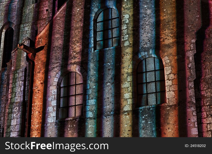 Detail of a wall of an old building in Chartres (Eure&Loir in France) during the yearly summer illumination nights. Detail of a wall of an old building in Chartres (Eure&Loir in France) during the yearly summer illumination nights.