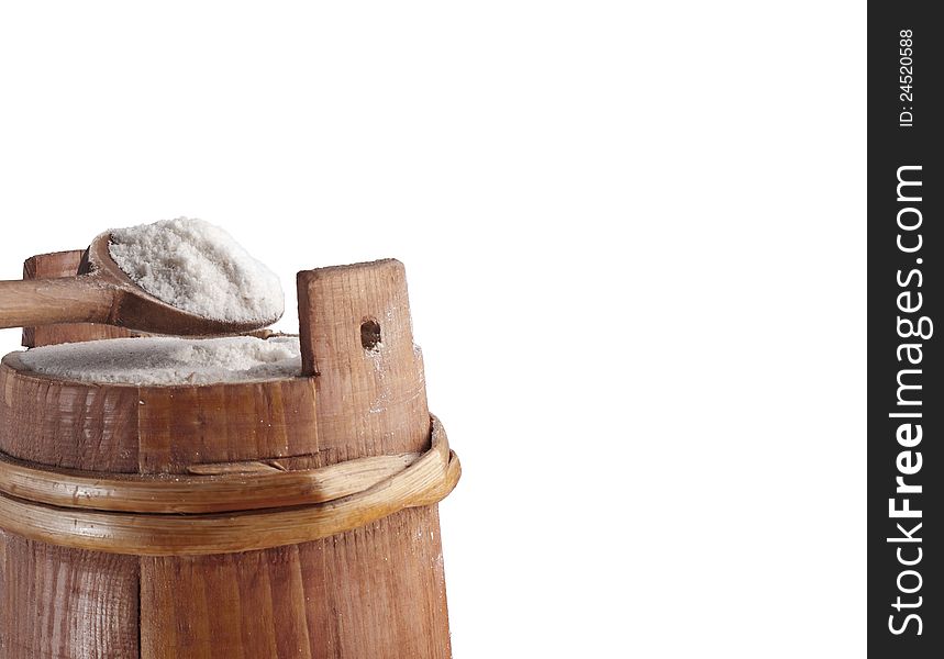 Close up of flour in a small wooden barrel