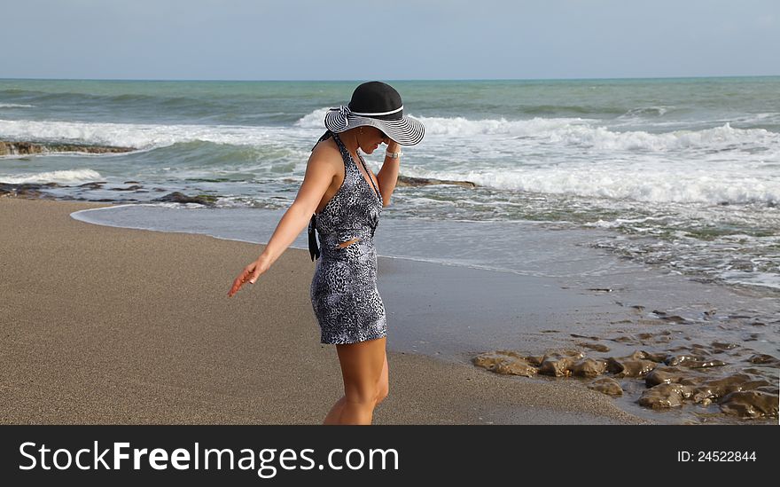 Walking Girl On The Beach