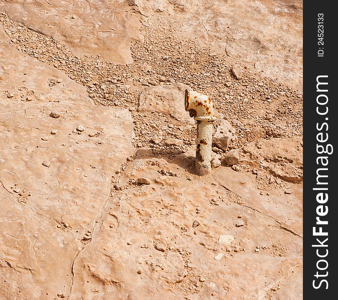 Water pipe is installed in the rock in the desert Negev