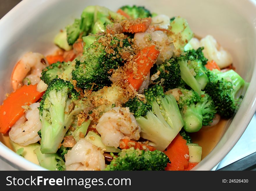 Fried shrimp  vegetables in a big bowl. Fried shrimp  vegetables in a big bowl