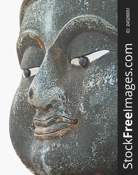 stone buddha statue close up face