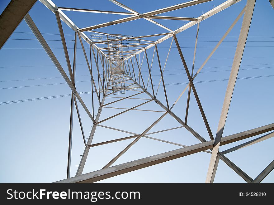 Inside Of Steel Pylon On Blue Sky