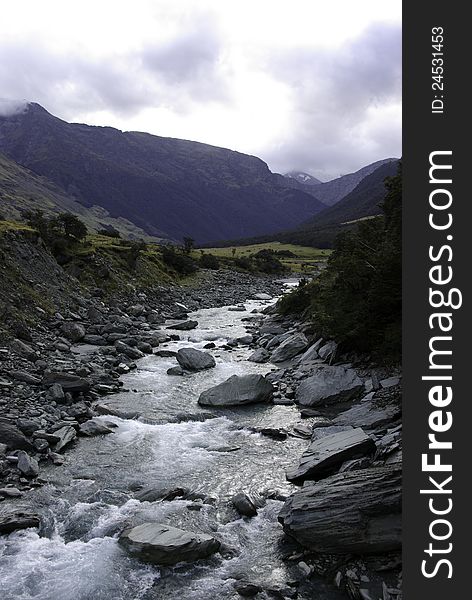 River in the south of New Zealand comming from the mountains and fed from a glacier. River in the south of New Zealand comming from the mountains and fed from a glacier