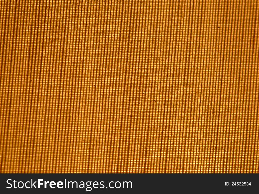 Closup of a cross weave background lite from behind