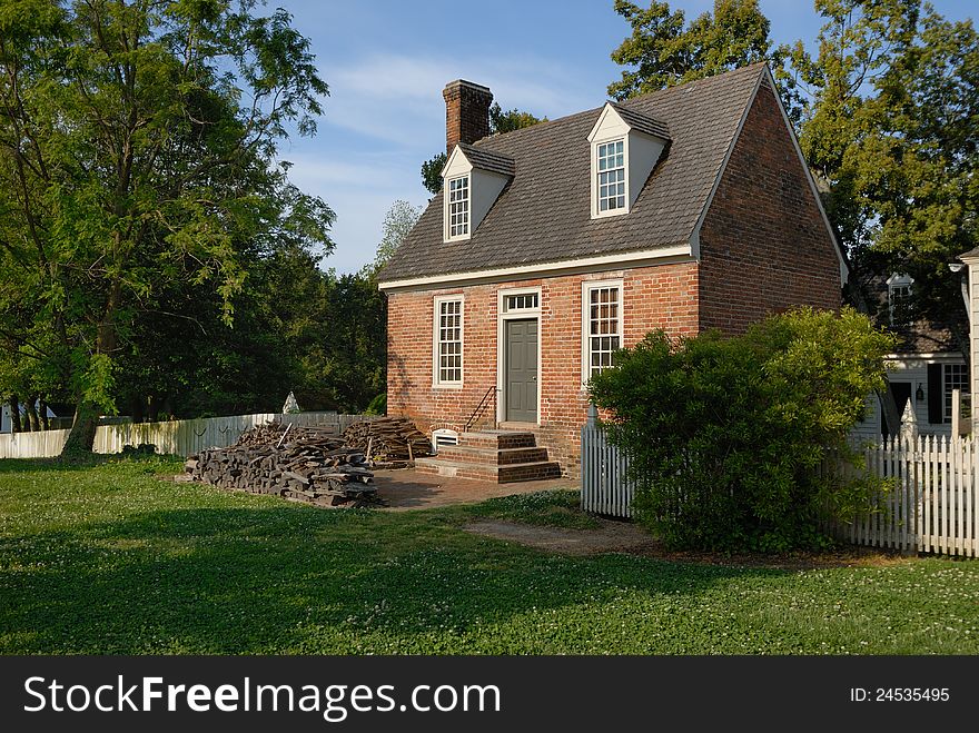 Colonial house in Williamsburg Virginia with white picket fence. Colonial house in Williamsburg Virginia with white picket fence