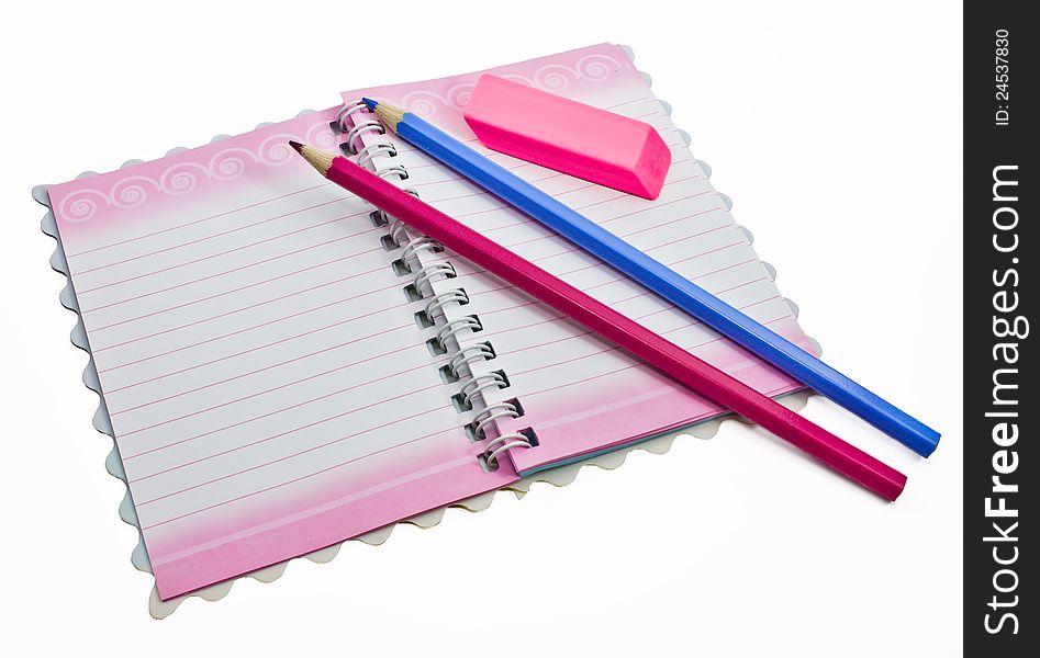 Notebook, blue and pink pencil eraser. Notebook, blue and pink pencil eraser