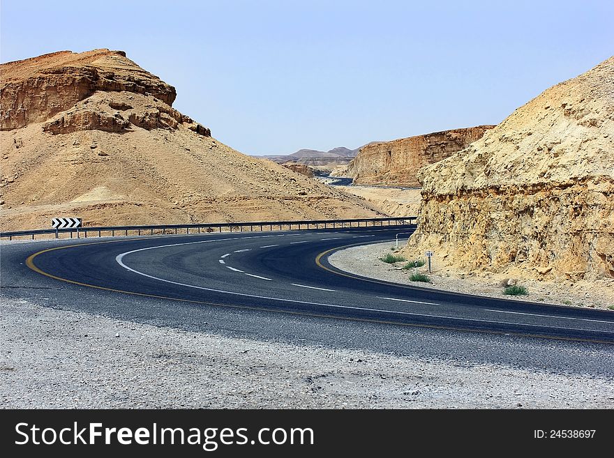 A sharp turn on a mountain road. A sharp turn on a mountain road