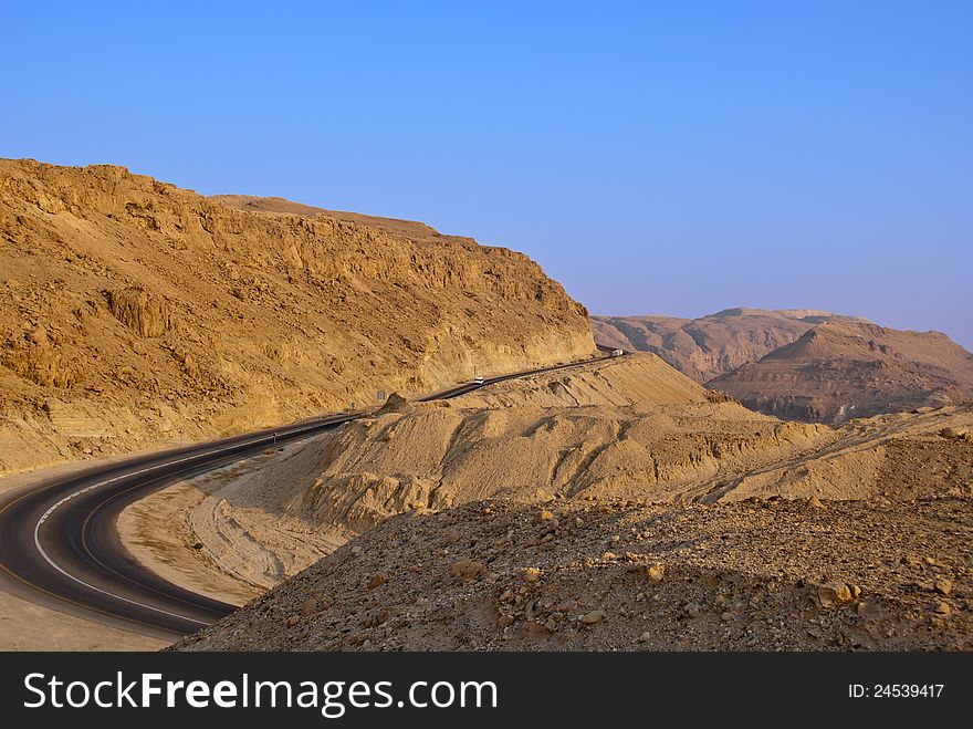 Mining paved road in the desert near the Dead Sea. Mining paved road in the desert near the Dead Sea
