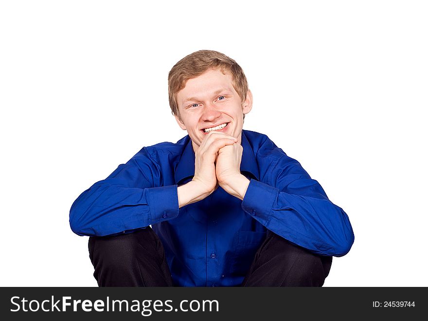 Happy guy sitting on a chair isolated. Happy guy sitting on a chair isolated