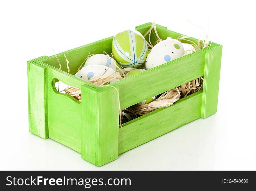 Easter eggs in wooden box