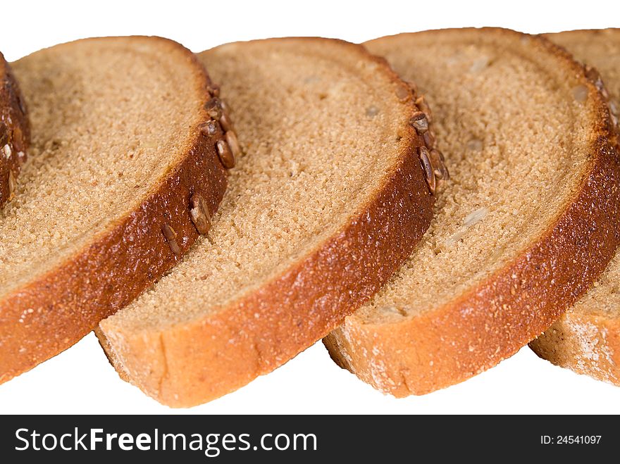 Slices of delicious bread with seeds isolated. Slices of delicious bread with seeds isolated