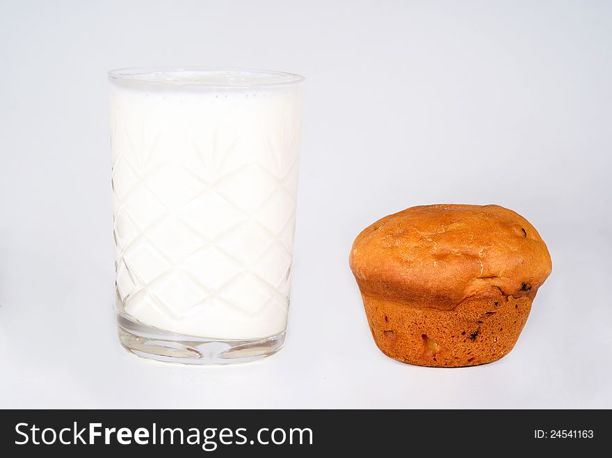 Delicious cake and milk in a glass