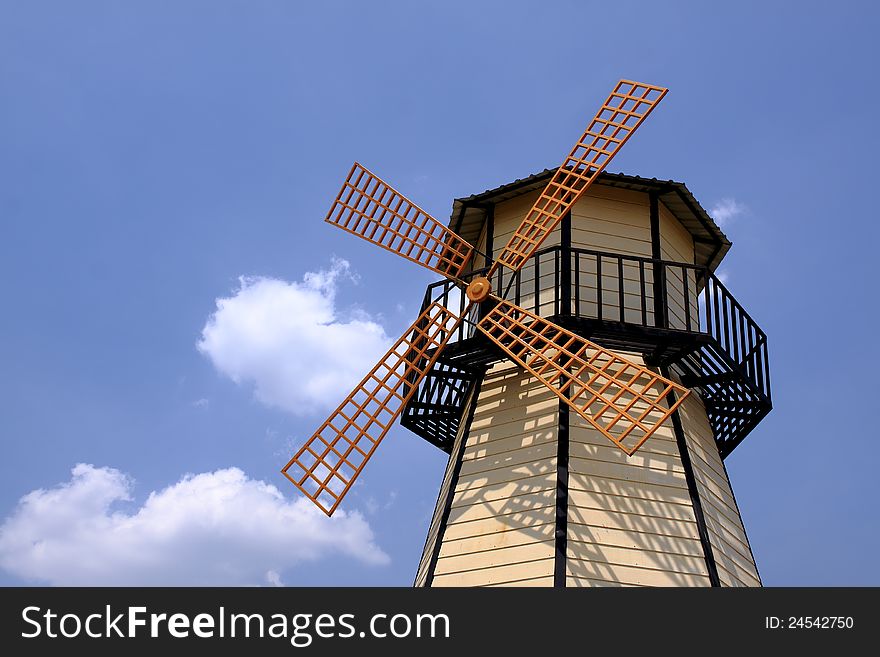 Windmill with  blue sky background