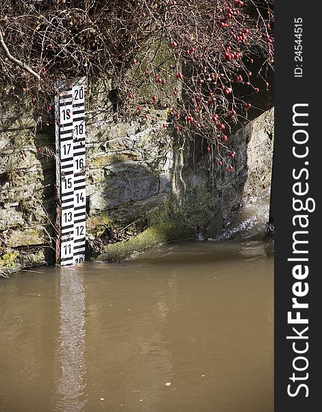 Scale for measuring water levels based on the stones. Scale for measuring water levels based on the stones