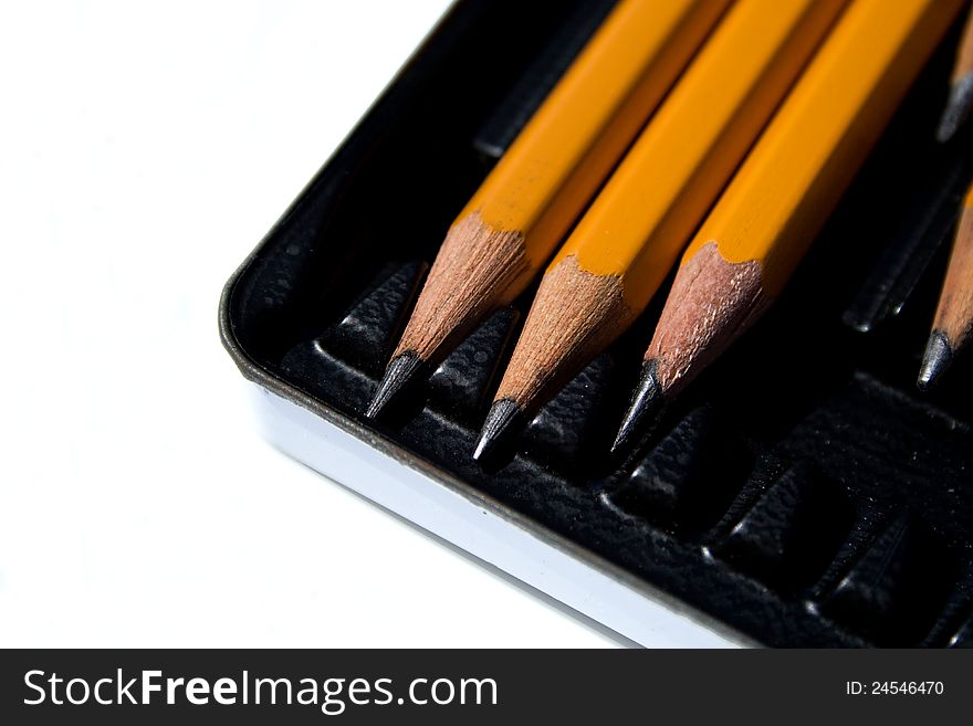 Drawing pencils in the box on white background