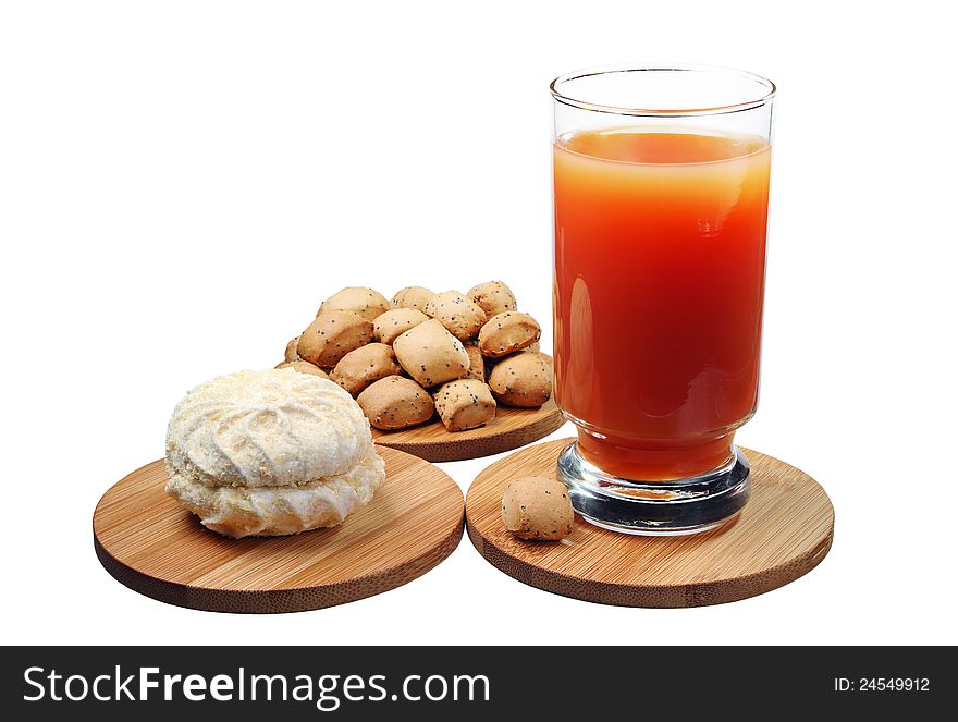 Sweet marshmallow with a glass of juice and small cookies isolated on white