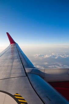 Wing Of An Airplane With A View Over The Clouds Royalty Free Stock Photography Wing Of An Airplane With A View Over The Clouds Royalty Free Stock Photography